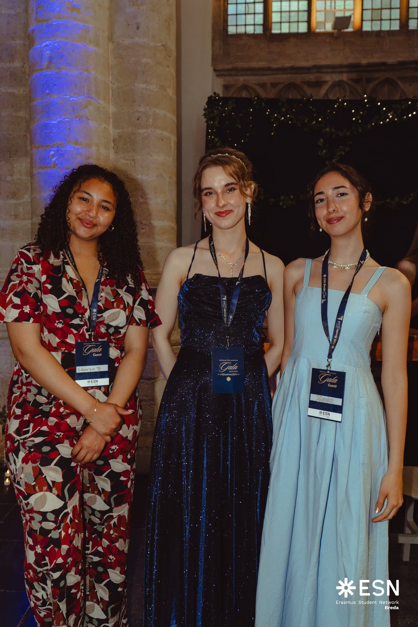 Portrait of three ESN members at a formal event