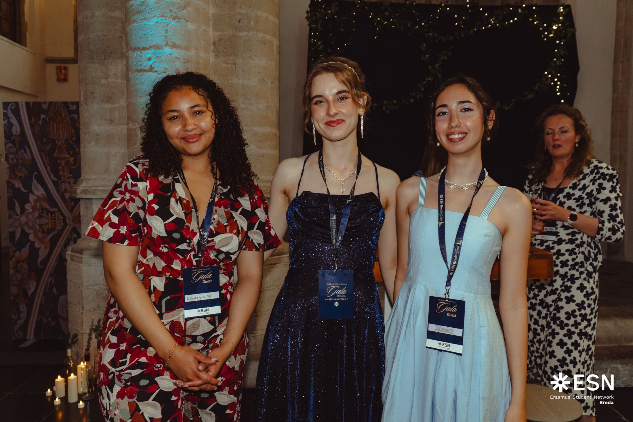 Three ESN members dressed for a formal international event